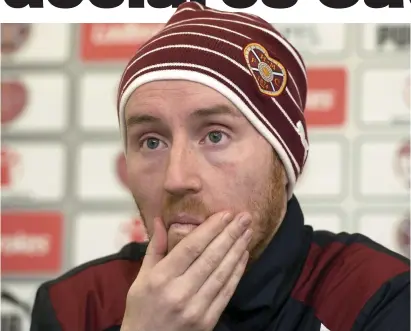  ??  ?? Pensive: Cathro faces the media yesterday but was not about to back down from any of his previous statements