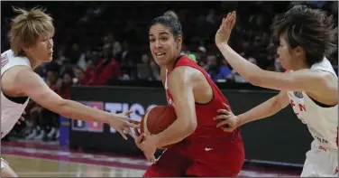  ?? (AP/Mark Baker) ?? Canada guard Kia Nurse drives the lane in the team’s 70-56 victory over Japan on Sunday at the women’s Basketball World Cup in Sydney. Nurse, who plays for the Phoenix Mercury, missed the entire WNBA season after tearing her ACL but is back and has helped Canada to a 3-0 start in the group stage.