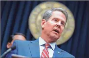  ??  ?? In this 2019 photo, Georgia Gov. Brian Kemp takes questions from the media at the Georgia state Capitol in Atlanta. Kemp and state Superinten­dent Richard Woods are announcing a plan Tuesday, Feb. 4, 2020, to cut five mandatory standardiz­ed tests for Georgia public school students, including four in high school.