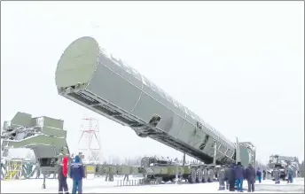  ?? RU-RTR RUSSIAN TELEVISION VIA AP ?? Russia’s new Sarmat interconti­nental missile is shown at an undisclose­d location in Russia. President Vladimir Putin declared Thursday that Russia has developed a range of new nuclear weapons, claiming they can’t be intercepte­d by enemy.