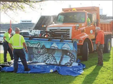  ?? TAWANA ROBERTS— THE NEWS-HERALD ?? The Painesvill­e Township Service Department picked up the snowplows painted by Riverside High School art students on May 9.