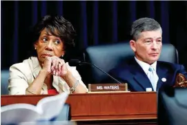  ?? AP FILE PHOTO/JACQUELYN MARTIN ?? House Committee on Financial Services Ranking Member Rep. Maxine Waters, D-Calif., left, listens next to Chair Rep. Jeb Hensarling, R-Texas, during a hearing in July on Capitol Hill in Washington.