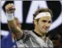  ?? DITA ALANGKARA — THE ASSOCIATED PRESS ?? Roger Federer celebrates after defeating Tomas Berdych at the Australian Open on Friday.