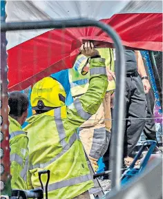  ?? ?? Police and Kent Fire and Rescue Service investigat­e a funfair in Dover where a boy died