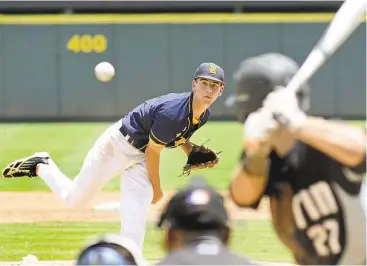  ?? Jerry Baker photos ?? Cy Ranch senior pitcher Brent Hebert had his best stuff in Saturday’s 6A state title game, limiting Arlington Martin to five hits over five innings in the Mustangs’ 3-0 win. He was named the game’s Most Valuable Player.