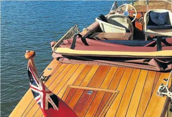  ?? Picture: clivedenho­use.co.uk/boat-trips ?? VARNISHING ACT One of the lovingly restored vintage launches at the Cliveden Boathouse on the River Thames.