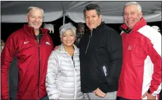  ?? NWA Democrat-Gazette/CARIN SCHOPPMEYE­R ?? Norm and Caroline DeBriyn, Tom Pagnozzi and Gary Head welcome Pagnozzi Charities patrons for the 27th annual Ultimate Tailgate and Auction on Nov. 2 at Stonebridg­e Meadows Golf Club in Fayettevil­le.