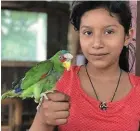  ?? | PHOTO : OUEST-FRANCE ?? Izamal, une ville très pittoresqu­e et dépaysante ; Tulum et ses vestiges ; le marché de Ticul, riche en couleurs et en odeurs ; Yuli et son perroquet Pitchi, à Calakmul.