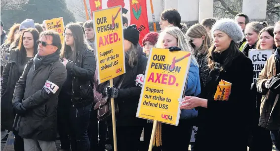  ?? RICHARD WILLIAMS ?? Lecturers and students outside Cardiff University during one of the walk-outs in a protest over pensions