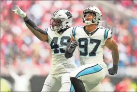  ?? Mark brown/Getty images north america/Tns ?? Yetur Gross-Matos (97) of the Carolina Panthers reacts after recording a sack in the fourth quarter against the Atlanta Falcons at Mercedes-Benz Stadium in Atlanta on Oct. 31.