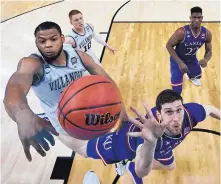  ?? CHRIS STEPPIG/ASSOCIATED PRESS ?? Villanova’s Omari Spellman, left, blocks a shot by Sviatoslav Mykhailiuk of Kansas during Saturday’s national semifinal. Villanova won to earn a trip to Monday’s championsh­ip game.