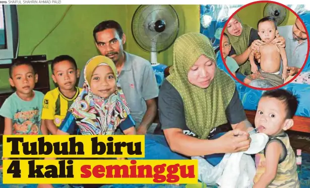  ?? FOTO: SHAIFUL SHAHRIN AHMAD PAUZI ?? ZAKIAH memberikan ubat kepada Mohd Darwish yang menghidap saluran jantung tersumbat.