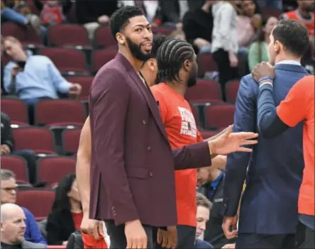  ?? DAVID BANKS ?? New Orleans Pelicans’ Anthony Davis stands near the bench before an NBA basketball game against the Chicago Bulls Wednesday, Feb. 6, 2019, in Chicago.