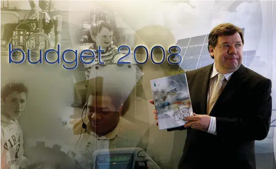  ?? Photo: PA ?? Budget 2008 is launched by then-finance minister Brian Cowen on December 5, 2007. By the following summer, the ill-fated budget had been binned.