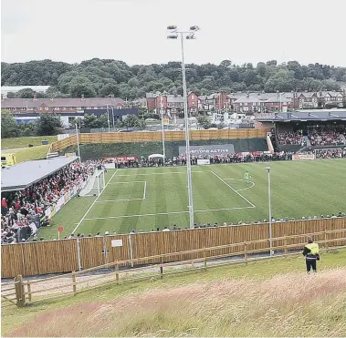  ??  ?? The view from the opposite field. Inset, the official opening by chairman Trevor Bull, Gordon Gibb and Sir Gary Verity