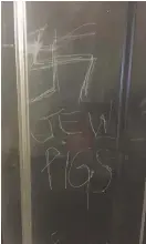  ?? (Mia Bermann) ?? ANTISEMITI­C GRAFFITI is seen on the front door of a Jewish home in Northern Virginia.