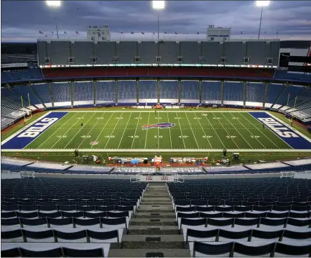  ?? GENE J. PUSKAR - THE ASSOCIATED PRESS ?? FILE - In this Dec. 13, 2020, file photo, the stadium is mostly empty before an NFL football game between the Buffalo Bills and the Pittsburgh Steelers in Orchard Park, N.Y. A person with direct knowledge of discussion­s tells The Associated Press the cost of the Bills proposed new stadium is $1.4billion; the stadium is to be built across the street from the team’s existing facility. The person spoke to The AP Thursday, Aug. 12, on the condition of anonymity because the details of proposal haven’t been made public.