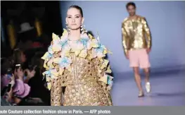  ?? — AFP photos ?? Models present creations by Georges Hobeika during the Women’s Spring-Summer 2020/2021 Haute Couture collection fashion show in Paris.