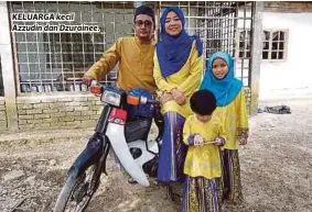  ??  ?? KELUARGA kecil Azzudin dan Dzurainee.