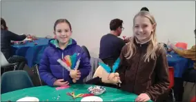  ?? MELISSA SCHUMAN - MEDIANEWS GROUP ?? Kendall Cicardi, left, and Sienna Hall, right, both 9, show off their turkey creations.