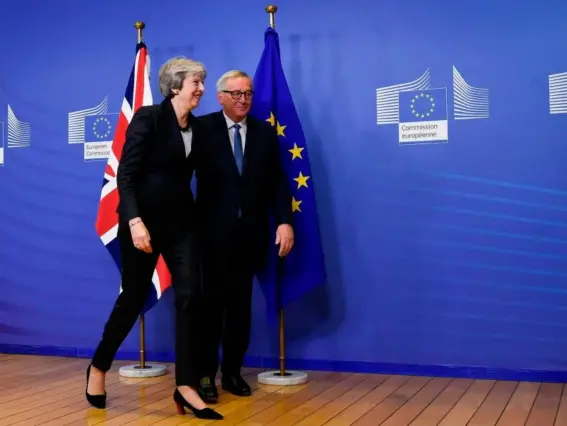  ??  ?? Theresa May and Jean-Claude Juncker in Brussels yesterday (AFP)