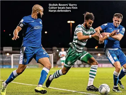  ?? ?? Stylish: Rovers’ Barry Cotter beats two Finn Harps defenders