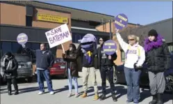  ?? GRAHAM PAINE, METROLAND ?? Save Bateman supporters gathered out front of Robert Bateman High School, in March in an unsuccessf­ul bid to keep the school from being closed.