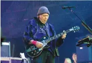  ?? PHOTO BY AMY HARRIS/INVISION/AP ?? Neil Young performs at the BottleRock Napa Valley Music Festival at Napa Valley Expo in 2019, in Napa, Calif.