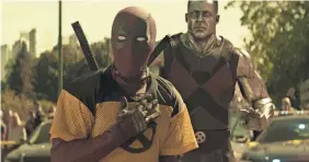  ?? 20TH CENTURY FOX ?? Wisecracki­ng Deadpool (Ryan Reynolds, front) runs into an old pal, X-Men powerhouse Colossus (Stefan Kapičić), in “Deadpool 2.”