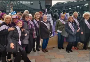  ??  ?? Dozens of women gathered at the Mary Barbour statue to await the ruiling