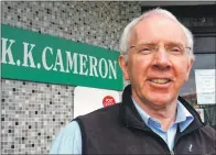  ?? Photograph by Anthony MacMillan Photograph­y. ?? Kim Cameron outside the store in Caol as he retires after 50 years at the helm.