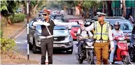  ??  ?? THE RIGHT OF WAY: Military Police sharing the traffic beat with Traffic Police