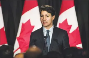  ?? CP PHOTO AARON VINCENT ELKAIM ?? Prime Minister Justin Trudeau speaks to the Ahmadiyya Muslim Community in Woodbridge, Ont., during a Liberal fundraiser on Tuesday.