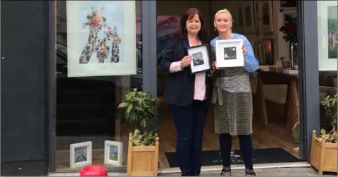  ??  ?? Claire O’Connell from The Gaslamp Gallery and artist Susan Caplice who have teamed up to help raise money for Make_A-Wish Ireland through the sale of limited edition framed beach art pieces.