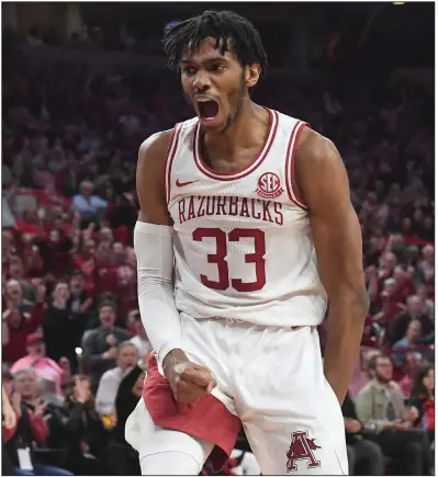  ?? (NWA Democrat-Gazette/J.T. Wampler) ?? Arkansas senior guard Jimmy Whitt celebrates after a late basket during the Razorbacks’ victory over LSU on Wednesday night at Walton Arena in Fayettevil­le. Whitt finished with 26 points and 15 rebounds as Arkansas won its final home game of the regular season.