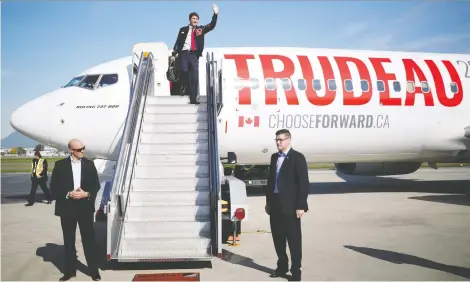  ?? STEPHANE MAHE/REUTERS ?? Justin Trudeau travelled in two jets during his election campaign while promoting climate change, says Diane Francis.