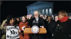  ?? OLIVIER DOULIERY/ABACA PRESS ?? Senate and House Democrats, including Charles Schumer and Nancy Pelosi, address President Donald Trump’s executive orders on Jan. 30 in front of the Supreme Court in Washington, D.C.