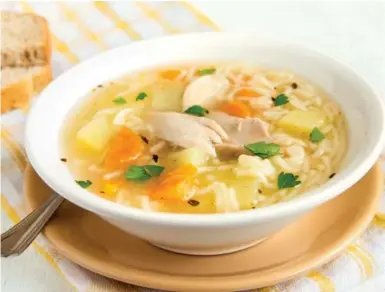  ?? DREAMSTIME ?? The combinatio­n of chicken, homemade broth, veggies (such as carrots, celery and onions) and noodles or rice in chicken soup is immune-boosting and soothing, and the warm broth clears your nasal passages and keeps you hydrated.
