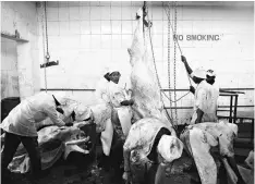  ??  ?? Worker at an abatoir in the Kenyan capital Nairobi, prepare to extract bowels from slaughtere­d animals on Aug 23 before they are delivered for inspection for plastic waste.