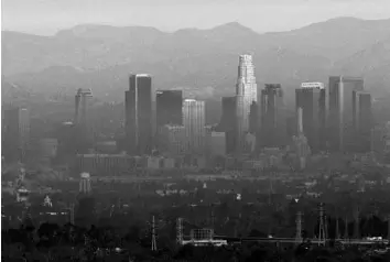 ?? FRANCINE ORR/LOS ANGELES TIMES ?? Smog, seen hovering near Los Angeles, is created when nitrogen oxides and volatile organic compounds cook in sunlight. A recent decline in nitrogen oxide levels has started to level off in many parts of the U.S., a recent study shows.