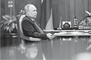  ?? MIKHAIL KLIMENTYEV/KREMLIN POOL PHOTO ?? Russian President Vladimir Putin attends a meeting Wednesday in Moscow.