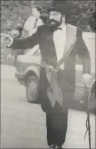  ?? (Pic: The Avondhu Archives) ?? Michael Fennessy, pictured leading the way as grand marshal at the Fermoy St Patrick’s Day parade in 1990.