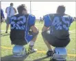  ?? CONTRIBUTE­D PHOTO/CHRISTIAN ROACH ?? Avery Hennick, left, and Daniel Nichols wait to get back into action while watching their teammates on the Cape Breton Panthers face the Dartmouth Destroyers in Nova Scotia Football Bantam action at Open Hearth Park in Sydney, Sept. 22.