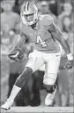  ?? Grant Halverson Getty Images ?? CLEMSON quarterbac­k Deshaun Watson threw for 306 yards and five touchdowns in the win.
