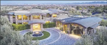  ?? The Ivan Sher Group ?? The Summerlin home measures 14,464 square feet and sits on 1.65 acres. It was built in 2009 by luxury builder Sun West Custom Homes.