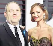  ?? Pascal Le Segretain Getty Images ?? HARVEY WEINSTEIN and his wife, Georgina Chapman, are shown at an Oscar party in February. Chapman announced she is divorcing her husband.
