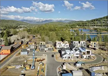  ?? Photograph­s by Carolyn Cole Los Angeles Times ?? REAL ESTATE is booming in the Sierra town of Truckee, Calif. Many people who can now work virtually are leaving big cities and moving into areas where they used to only be able to spend weekends.