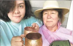  ?? Margo Martindale / Contribute­d photo ?? Emmy winner Margo Martindale, right, enjoys a Moscow mule, “ginger beer and vodka in a very, very cold cup,” with her daughter, Maggie, while taking a break from gardening outside her Kent home.