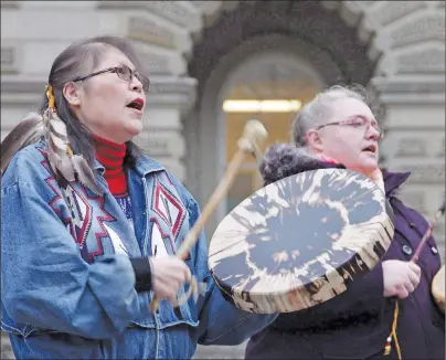  ?? CP PHOTO ?? Marcia Brown Martel (left) is seen outside court in Torontoin this Dec. 1, 2016 photo. The Canadian Press has learned that the federal government has agreed to pay hundreds of millions of dollars to Indigenous survivors of the ‘60s Scoop.