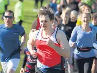  ?? Picture: Kris Miller. ?? Gary Seath leads runners off the start line in Pittencrie­ff Park yesterday.